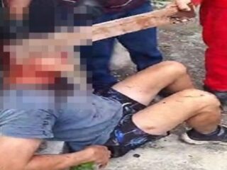 IMAGENS FORTES: Populares espancam homem acusado de abusar de criança