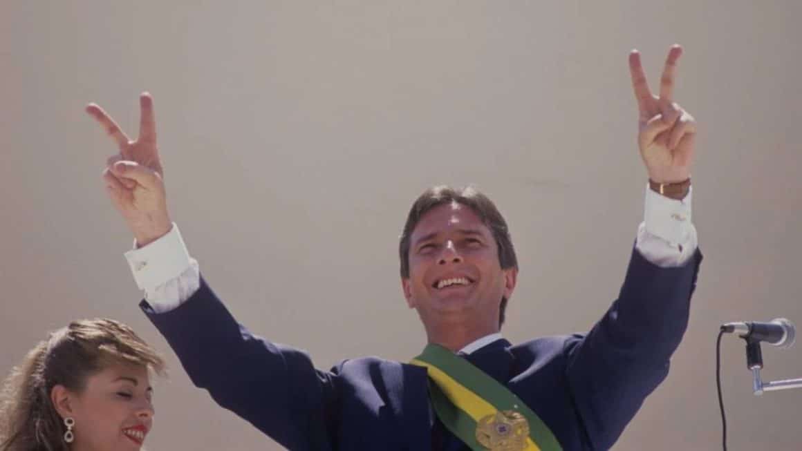 Eleições de 1989: O Retorno do Voto Direto e a Vitória de Collor Urna eletrônica e cédulas eleitorais representando o período de redemocratização do Brasil.